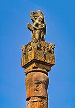 484 CE Buddhagupta pillar at Eran, raised in honour of Janardana, another name of Vishnu, dated year 165.[147] On top is a double statue of Garuda.[148]
