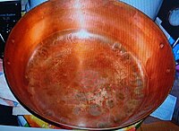 A copper bowl for cooking confiture