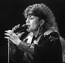 Lisa Lisa during a group performance, 1987