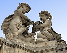 Towards the Grand Trianon: children at the brazier. The fire.