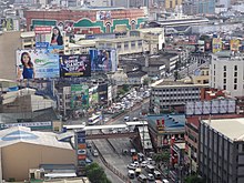 Aerial view of the boulevard's southwestern terminus with Nicanor Reyes Street to the left (obscured by buildings) and Lerma Street to the right