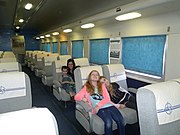 Visitors pose inside the Santa Fe "Diablo Canyon" Coach Car #3079.