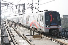 The outside of an Airport Express train, outdoors