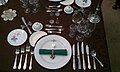 Formal place setting for 8-course dinner