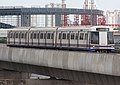 Blue Line train from Bang Sue approaching Tao Poon station