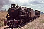 East African Railways 30 class steam locomotive no. 3015 pulls a freight train near Morogoro, Tanzania, in 1967