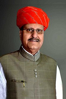 A man wearing a red turban