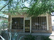 This historic building once housed Peoples Drug Store. This structure was built c. 1940s at 111 East Dunlap Ave. Pharmacist Bob Rice established his pharmacy there and in 1953 installed what was the first pharmacy drive through window in Arizona and the fifth in the United States. The building was moved in 1999 to 737 E. Hatcher Road, its current location, and is the home of the Sunnyslope Historical Society and Museum.