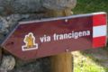 A sign pointing the way of the Via Francigena