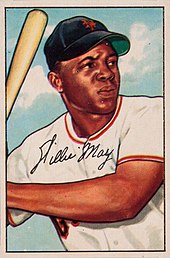 Painting on a baseball card of Mays in a white baseball uniform staring off to his left as he holds a baseball bat over his right shoulder