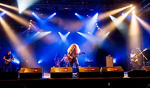 Coheed and Cambria performing in 2016 Left to right: Travis Stever, Josh Eppard (on drums), Claudio Sanchez, Zach Cooper