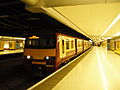 Class 320 322 at Glasgow Queen Street low level with a train to Airdrie