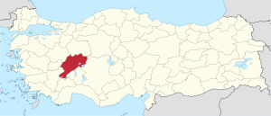 Afyonkarahisar highlighted in red on a beige political map of Turkeym