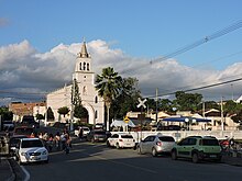 Road leading into a church with a somewhat cloudy sky in the city of Pauli Jacinto