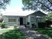 Frank Carden House built in 1936 is located at 7149 N. 58th Drive. Frank Carden operated a men's clothing store downtown, and he also became a justice of the peace.