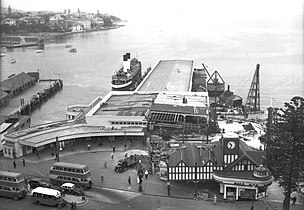 Manly Wharf being rebuilt, 1941, with ferry Dee Why berthed