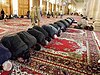 Muslims performing salah