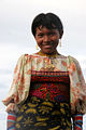 A (pretty) young woman in tradtional dress.