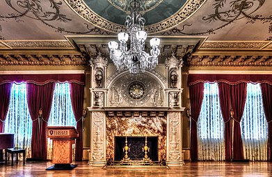 The Flagler Room, originally the hotel's Grand Parlor. One can see Tiffany Austrian crystal chandeliers and a massive onyx Thomas Edison clock (one of the first ever to be used in a public building).