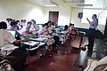 Wikimedia Philippines Vice President Jojit Ballesteros and the participants of UST Debate Forum