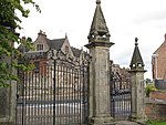 Churchyard gate piers and gates to the parish church of St Oswald