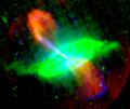 "False-colour image of Centaurus A, showing radio (red), 24-micrometre infrared (green) and 0.5–5 keV X-ray emission (blue)