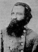 Grainy black and white photo shows James Argyle Smith with a heavy, dark beard and wearing a gray military uniform.