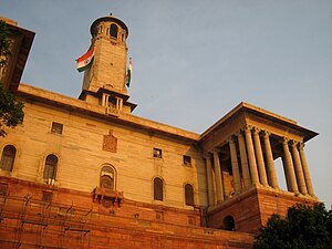 Colonnaded balconies and the tower with Indian flag.