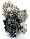 Crystals of slightly pink cobaltoan smithsonite, Tsumeb, 6.8 × 4.6 × 3.7 cm