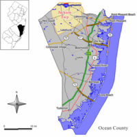 Location of Jackson Township in Ocean County highlighted in yellow (right). Inset map: Location of Ocean County in New Jersey highlighted in black (left).