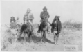 Image 24"Geronimo's camp before surrender to General Crook, March 27, 1886: Geronimo and Natches mounted; Geronimo's son (Perico) standing at his side holding baby." By C. S. Fly. (from Photojournalism)