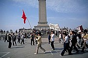 People protesting near the Monument to the People's Heroes.