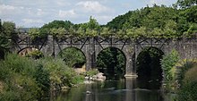 Bassaleg Viaduct, a four-arch stone bridge with metal bracing