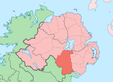 County Armagh, evenly centered, with Scotland a paler shade of the colour used for Northern Ireland to shows their national connection. Any paler looks wierd, but its just pale enough to not hint that those parts of Scotland belong to Northern Ireland which is the primary focus.