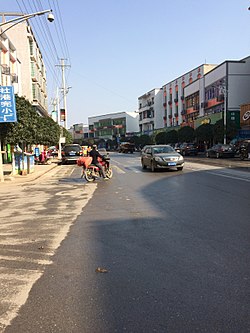 Residential buildings on both sides of the road in Shegang Town in December 2017.