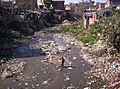 Image 25Poverty often leads to unhygienic living conditions, as in this community in the Indian Himalayas. Such conditions promote contraction of diarrheal diseases, as a result of contaminated drinking water, poor sanitation and hygiene. (from Drinking water)