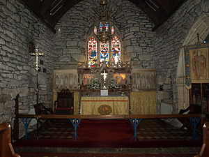 The high altar with the reredos of alabaster with fourteen Cornish saints