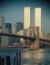 World Trade Center exterior with Brooklyn Bridge in foreground, 1973