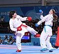 Kokoro Sakaji attacks Anna Chernysheva during the fight