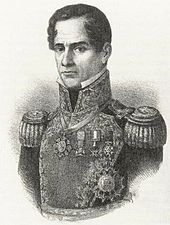 A lithograph showing the bust of a clean-shaven man. He is in military dress uniform with one medal around his neck and several others pinned at his shoulder.