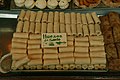 Hueso de santo [es] (saint's bones) and buñuelos (similar to fritters) are very typical of Halloween and All Saints' Day.