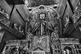 A statue of Maitreya Buddha inside Trikal Maitreya Buddha Vihara (Jamchen Lhakhang Monastery) at Bouddhanath premises, Kathmandu, Nepal