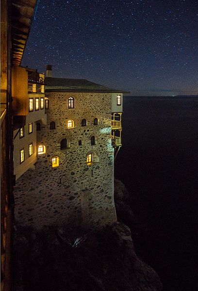 Greece: Osiou Gregoriou monastery (Greek: Μονή Γρηγορίου) is an Orthodox Christian monastery in the monastic state of Mount Athos. The monastery is built by the sea, on the southeastern side of the peninsula. It was founded by Saint (Osios) Gregory (Gregorios) and it is dedicated to Saint Nicholas. By the end of the 15h century, according to the Russian pilgrim Isaiah, the monastery was Serb. In 1990 the monastery had 71 working monks. The monastery holds 279 manuscripts, of which 11 are on parchment, and it has approximately 6,000 printed books.
