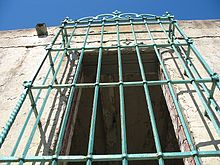 Wrought iron grill on window
