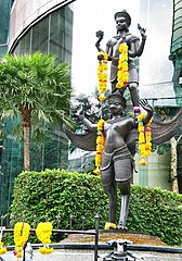 A statue in Bangkok depicting Vishnu on his vahana Garuda, the eagle. One of the oldest discovered Hindu-style statues of Vishnu in Thailand is from Wat Sala Tung in Surat Thani Province and has been dated to ~400 CE.[160]