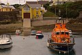 The current Ballycotton lifeboat Austin Lidbury and the new lifeboat station.