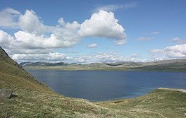 A large lake surrounded by hills