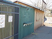 The original ticket booth made of wood of theWarren Ballpark. The Warren Ballpark was built in 1909 and is located in the corner of Arizona Street and Ruppe Road. The ballpark is one of the oldest professional baseball stadiums in the United States. It has hosted baseball Hall of Famers John McGraw, Connie Mack and Honus Wagner and also some of the members of the Chicago White Socks involved in the 1919 Black Sox Scandal, such as Hal Chase, Chick Gandil and Buck Weaver. The ballpark was listed in the National Register of Historic Places on October 15, 2010 as part of the Bisbee Residential Historic District, reference #10000233.