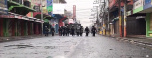 Police marching on the street during the protests