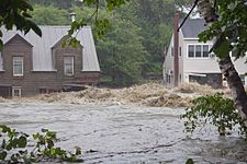 Flood waters from Tropical Storm Irene on the Ottauquechee River in Quechee, Vermont.
